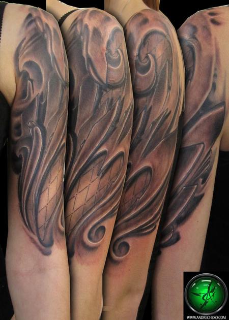 Andre Cheko - Biomechanical Lace Tattoo